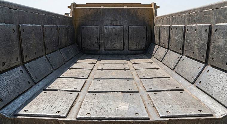 Rocktech wearplate liners protecting the inside of a haul truck body
